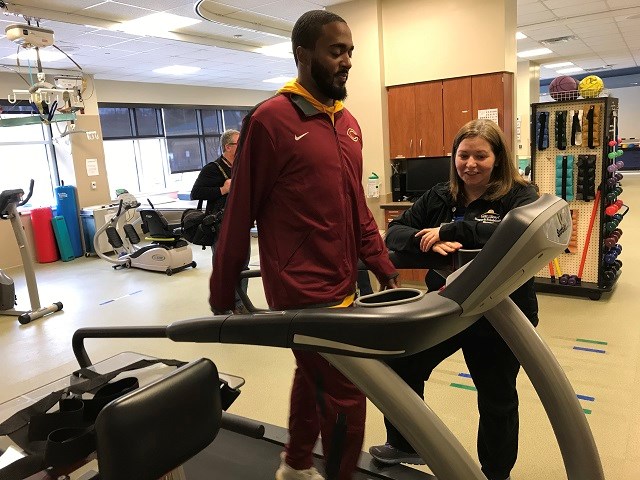 Kerry Glover tests his strength on the treadmill with the guidance of Jenny Reimold, physical therapist at WellSpan Surgery and Rehabilitation Hospital.