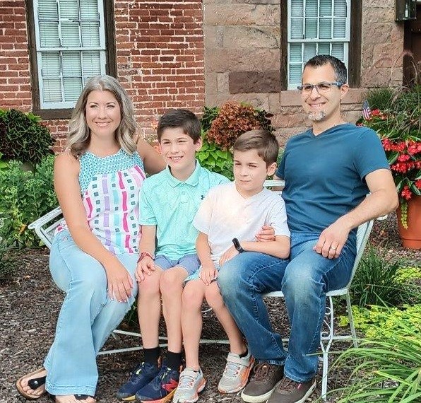 Stephanie (from left) with sons, Ian and Asher, along with husband Greg Martin see a positive difference in their family from the Positive Parenting Program through WellSpan Philhaven’s Center for Autism & Developmental Disabilities (CADD).