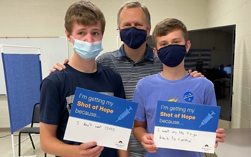 Jack (left) and Ben Goedecker got their COVID-19 vaccine. With them is their dad, WellSpan physician Dr. Mark Goedecker.