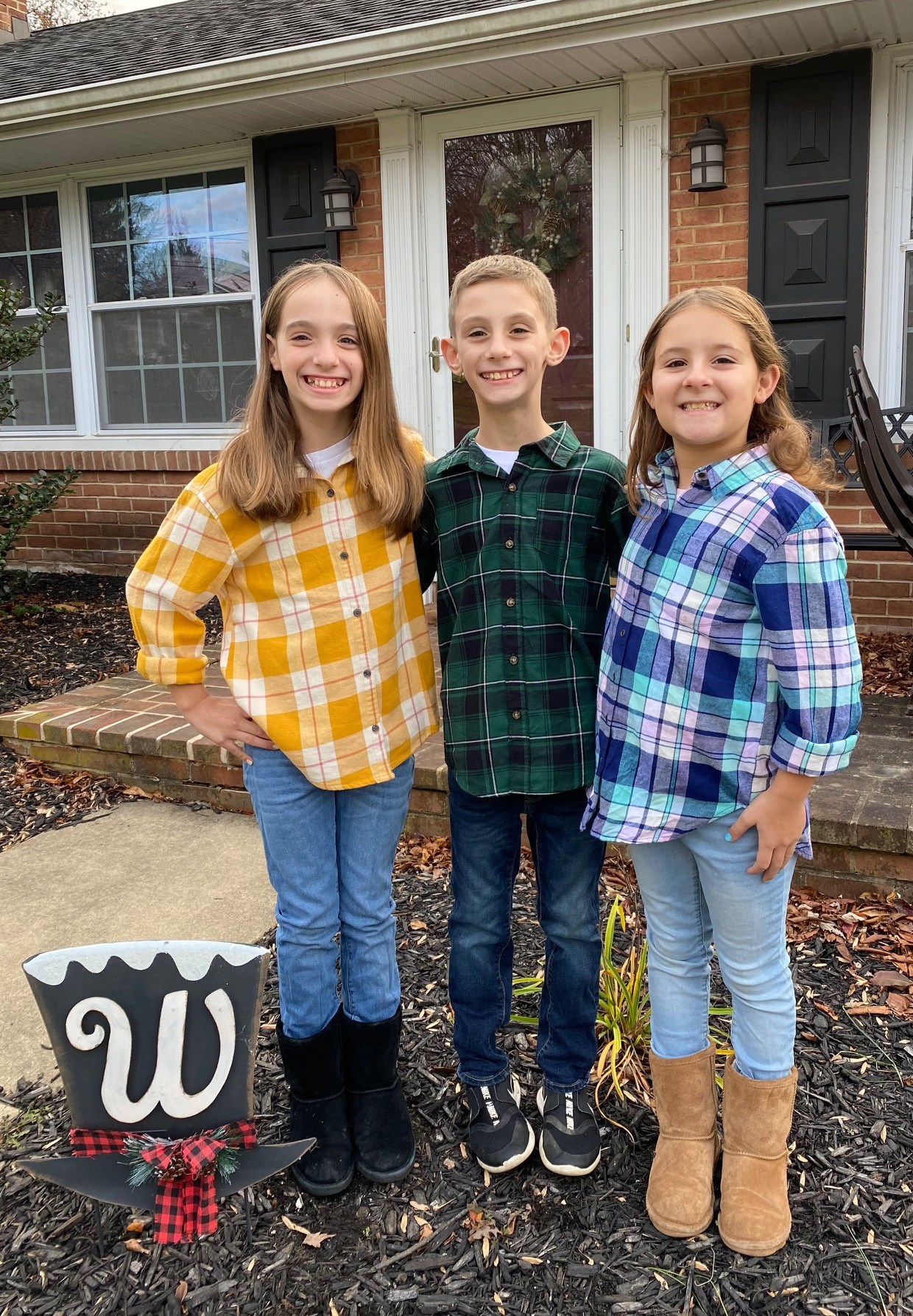 The Warren triplets today (from left) Addison, Aidan, and Ashley.