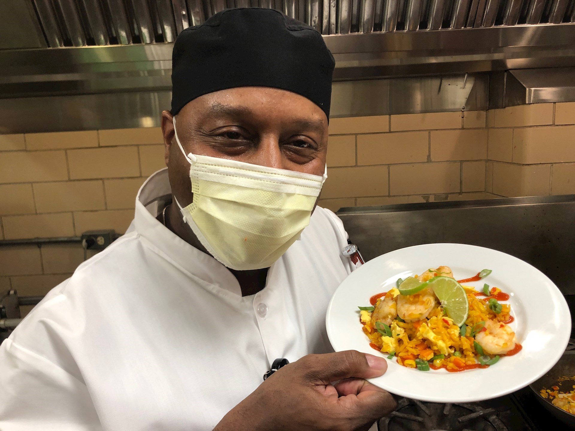 Dexter Tabb, a sous chef at WellSpan Good Samaritan Hospital, showcases his healthy version of brown fried rice and shrimp.