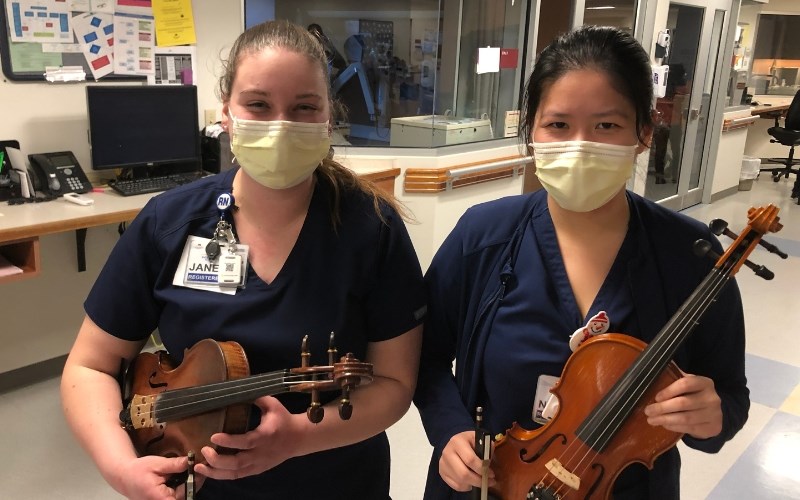 Janelle Kovacs (left) and Nicole Siegrist both brought their violins into WellSpan Good Samaritan Hospital's cardiovascular/intensive care unit, to play for a dying patient in her last days.