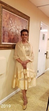 Wegayhu Ketema, RN, wears a traditional Ethiopian dress. 