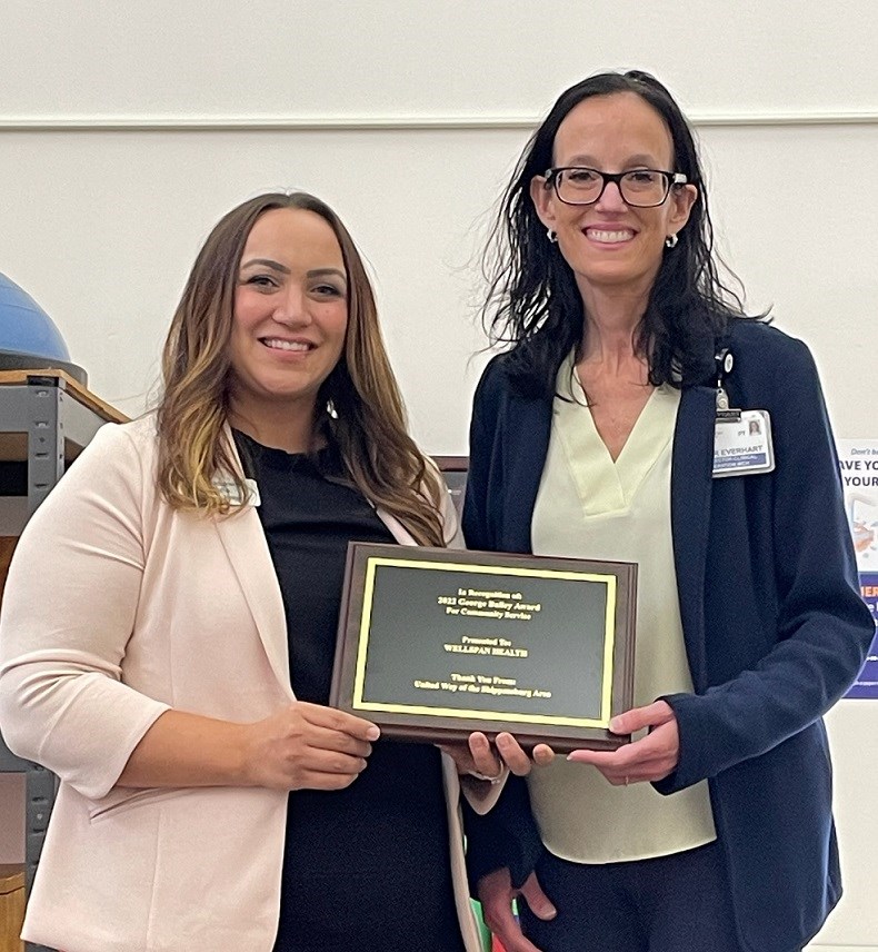 Nina Reese, chair of the board of United Way of the Shippensburg Area (Left) presented the George Bailey Award to WellSpan Health. Ginger Everhart, WellSpan senior director of Clinical Operations, accepts the award on behalf of WellSpan.