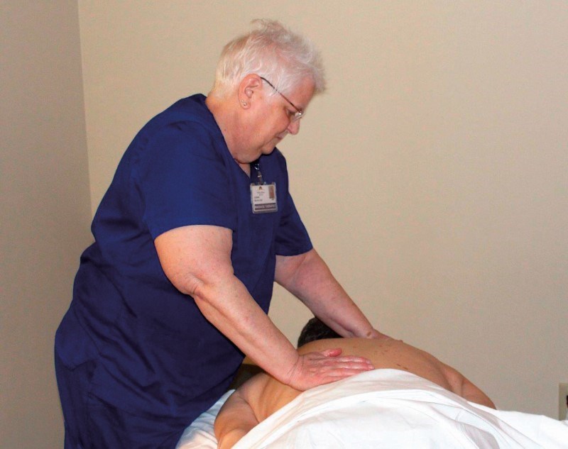 A patient receives a massage at WellSpan Adams Cancer Center.