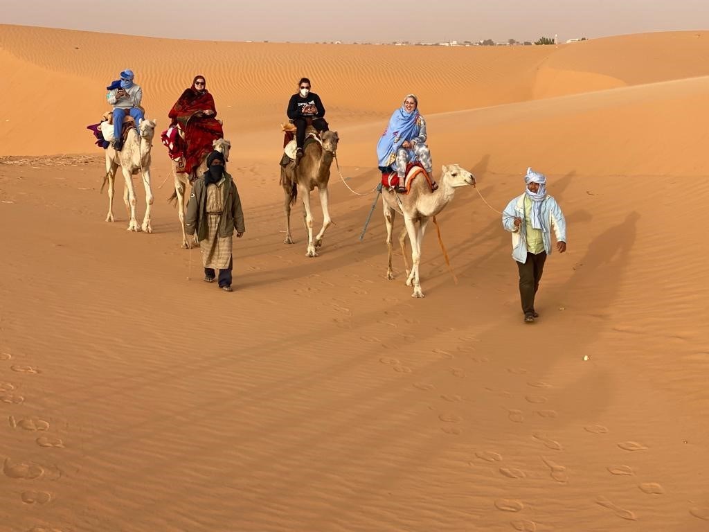 Riding camels was part of the experience of working and visiting Mauritania for WellSpan team members.