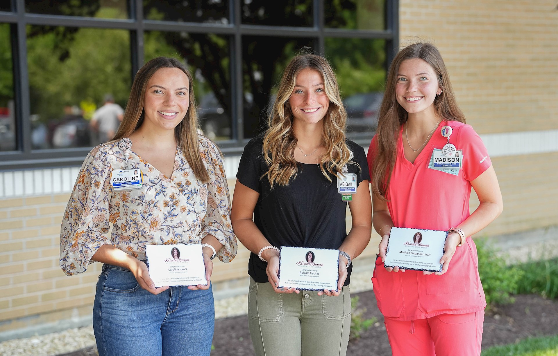 Caroline Hance (from left), Abigail Fischer, Madison Barnhart, and Sarah Goodman (not pictured) received  the Kristin Runyon Memorial Scholarship to support their nursing education.