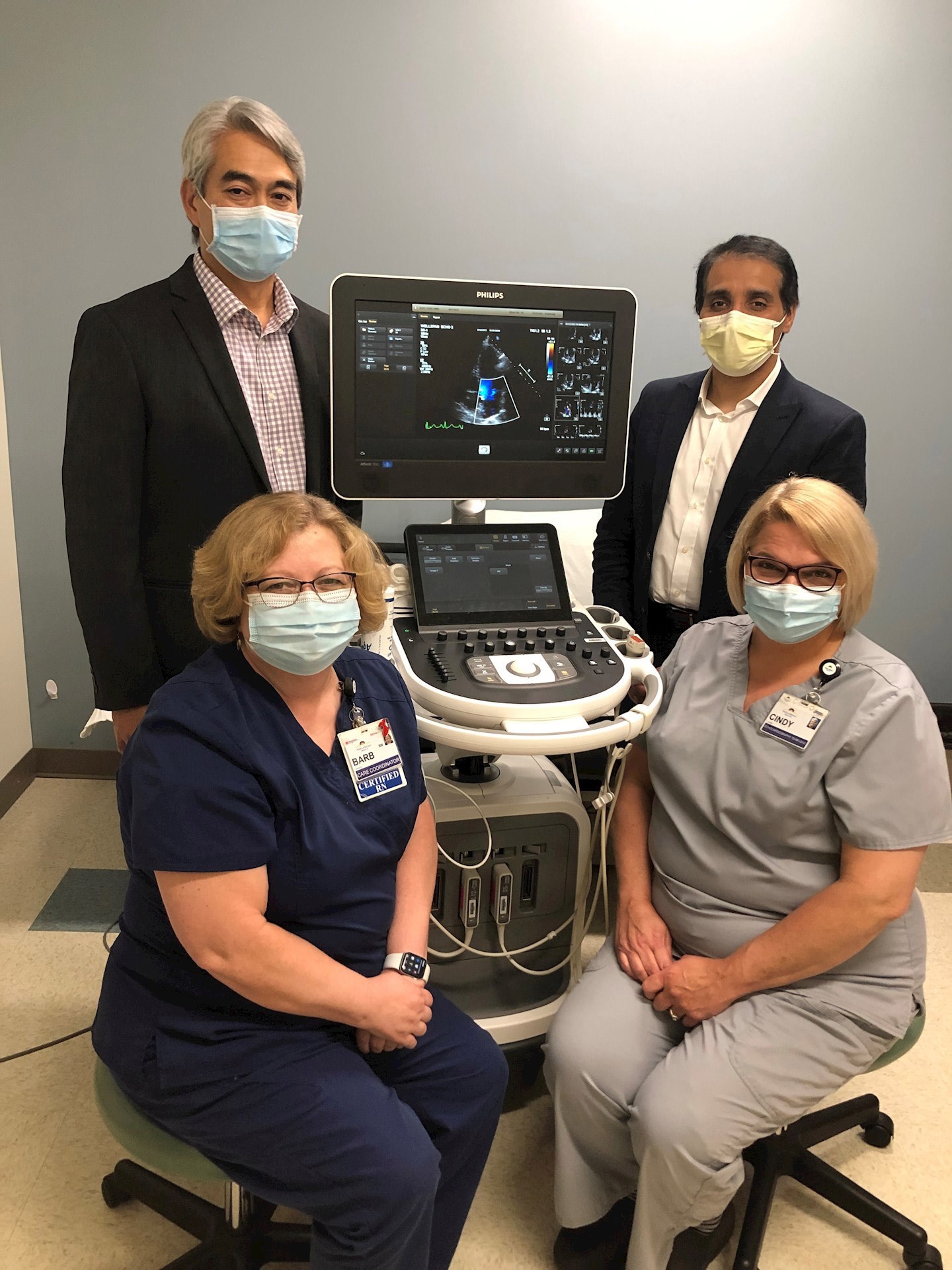 The WellSpan cardiac team that helped to save Susan Sensenig's life include (from top left, clockwise) Dr. Julian Esteban, Dr. C. Anwar A. Chahal, cardiac sonographer Cindy Lepard and registered nurse Barb Strock, with a monitor showing an echocardiogram.
