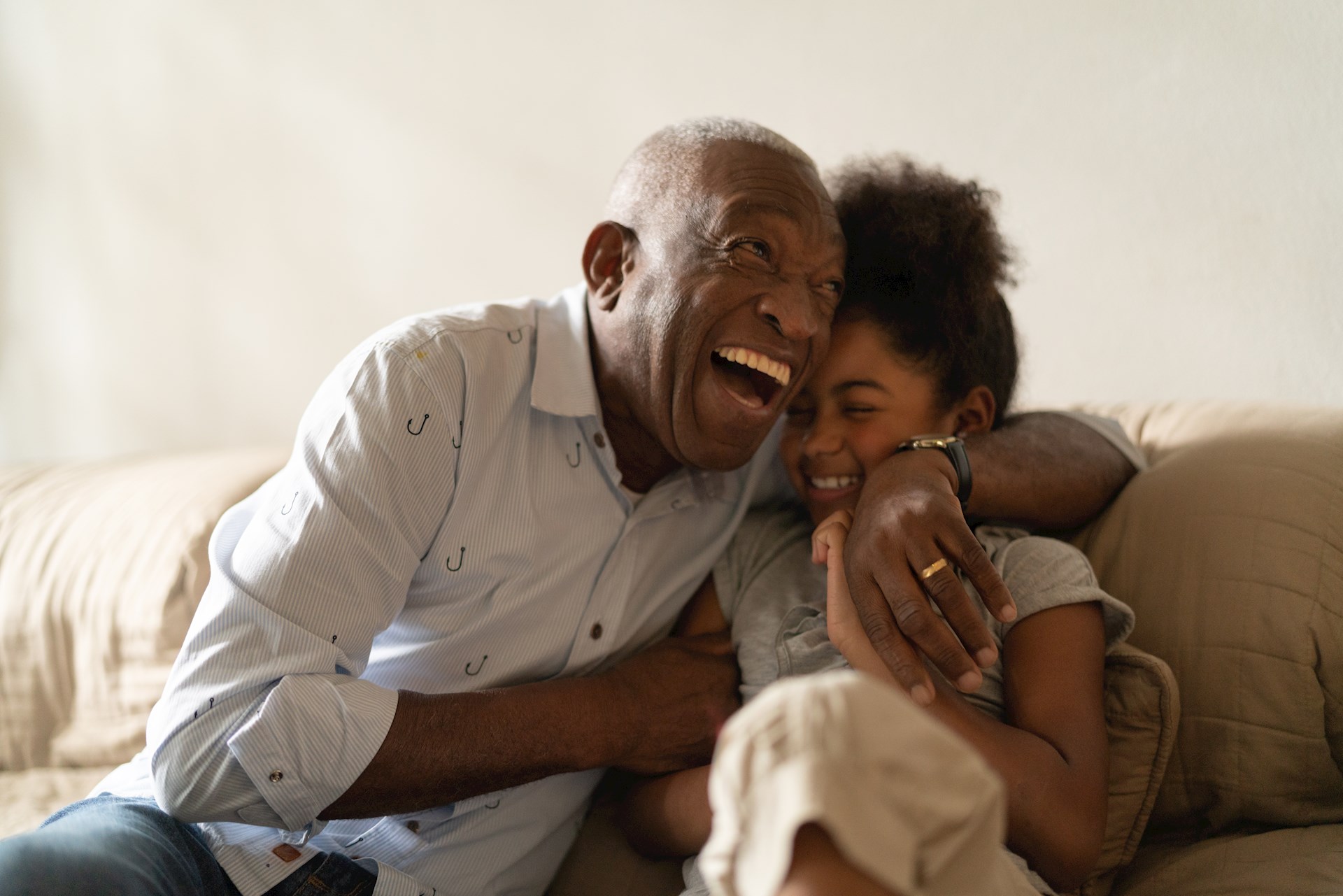 Under the new CDC guidelines, grandparents can see their grandchildren indoors, without masks, as long as the grandparents are fully vaccinated for COVID-19 and the grandchildren are not at risk of severe COVID-19.